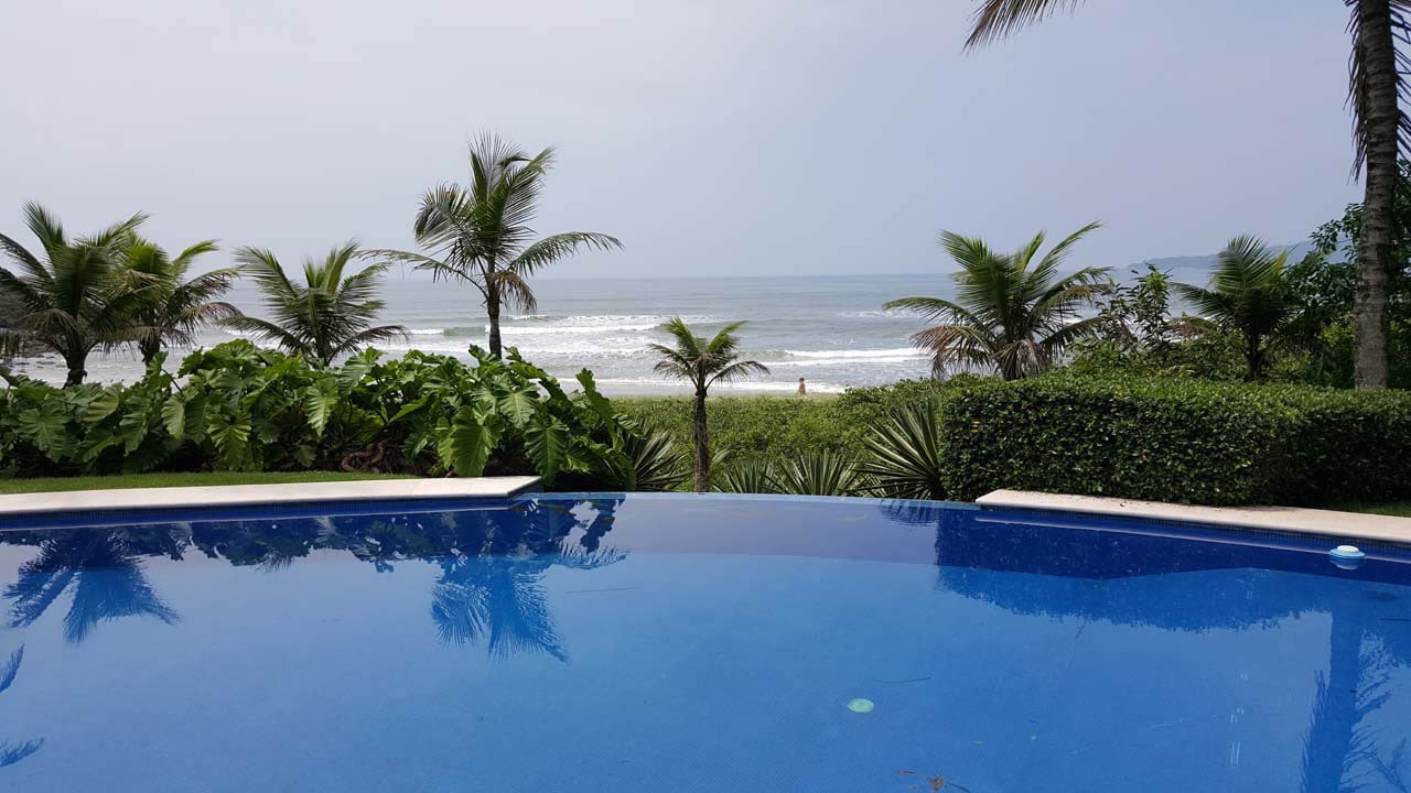 Imóveis Pé na Areia Condominio Iporanga Guarujá