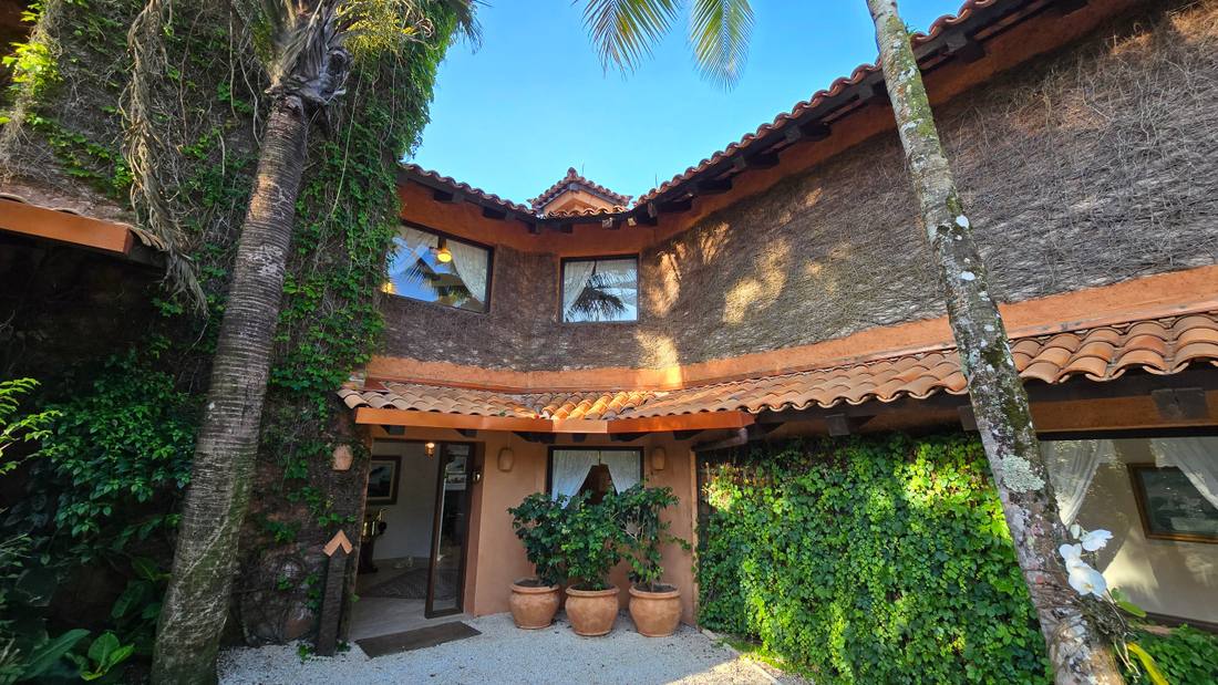 Casa no Condomínio Iporanga Guarujá — Villa 498